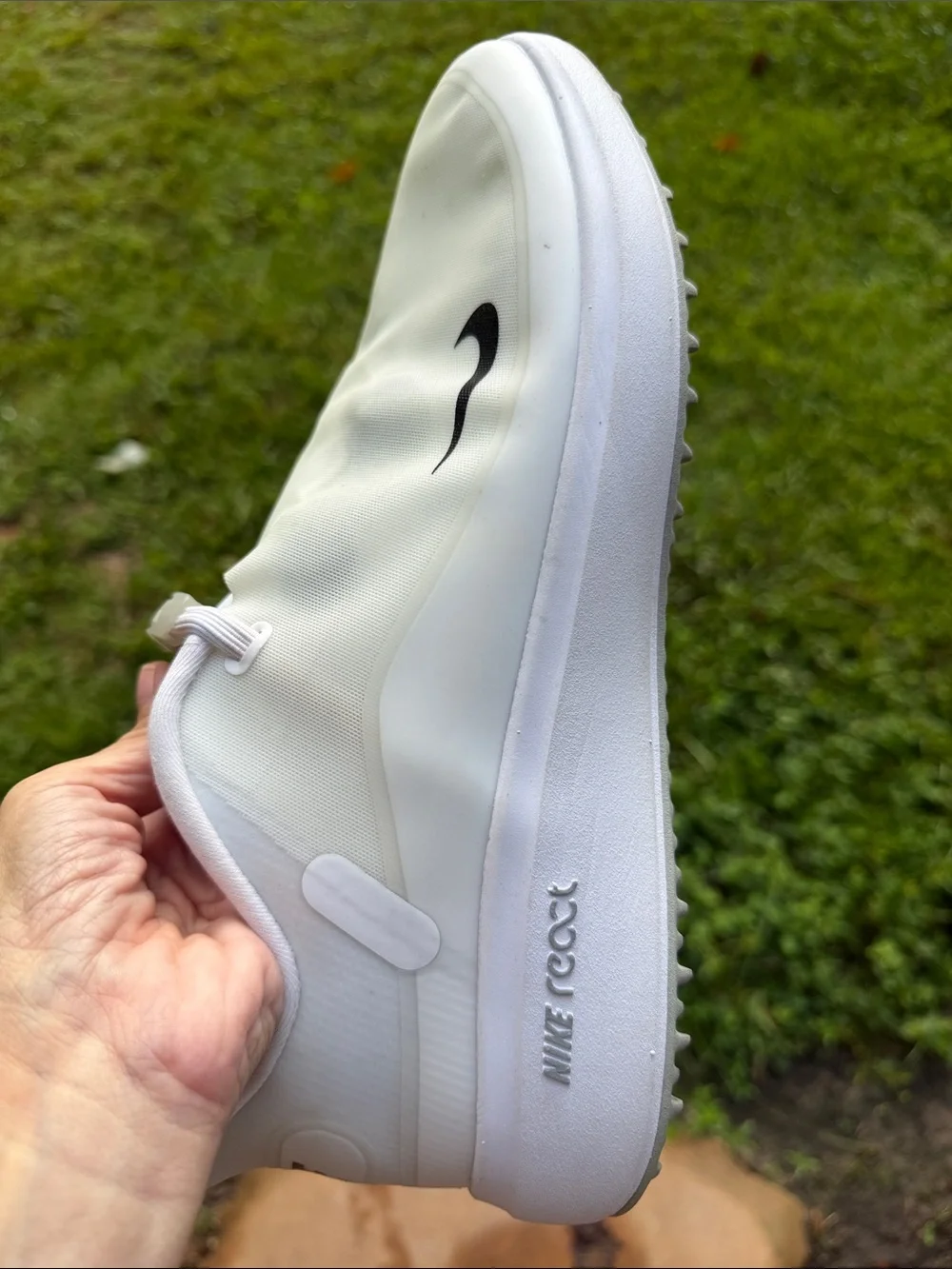 Nike Men’s White Slip-On Sneakers with Black Swoosh